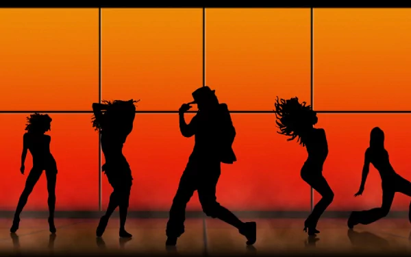 Silhouettes of dancers move against a vibrant orange backdrop, capturing the energy of music and dance in this captivating HD PC desktop wallpaper.
