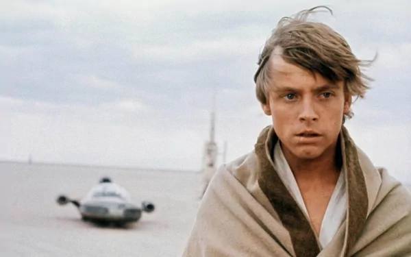 HD wallpaper of Luke Skywalker from Star Wars Episode IV: A New Hope, with a desert landscape and landspeeder in the background.
