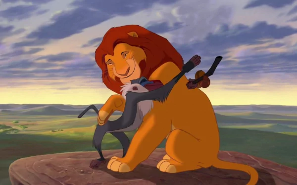 HD wallpaper of Simba with Rafiki on Pride Rock from The Lion King (1994).