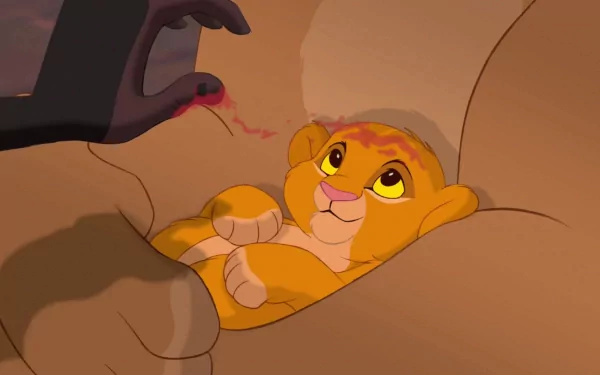 HD wallpaper of Simba cuddling with Mufasa's paw from The Lion King (1994).