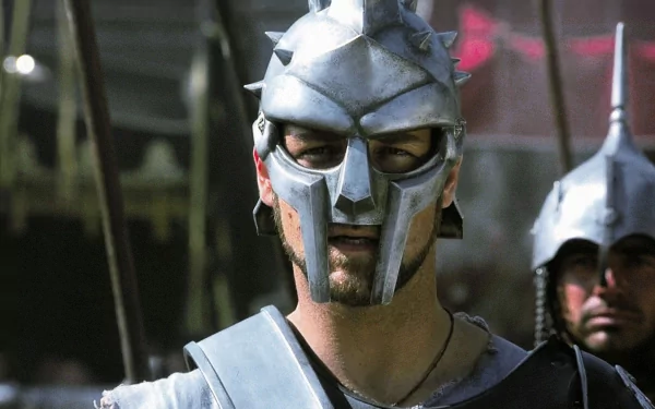 A high-definition desktop wallpaper featuring a gladiator in battle armor, from a movie scene. The gladiator's intensely focused expression and detailed metal helmet stand out vividly.