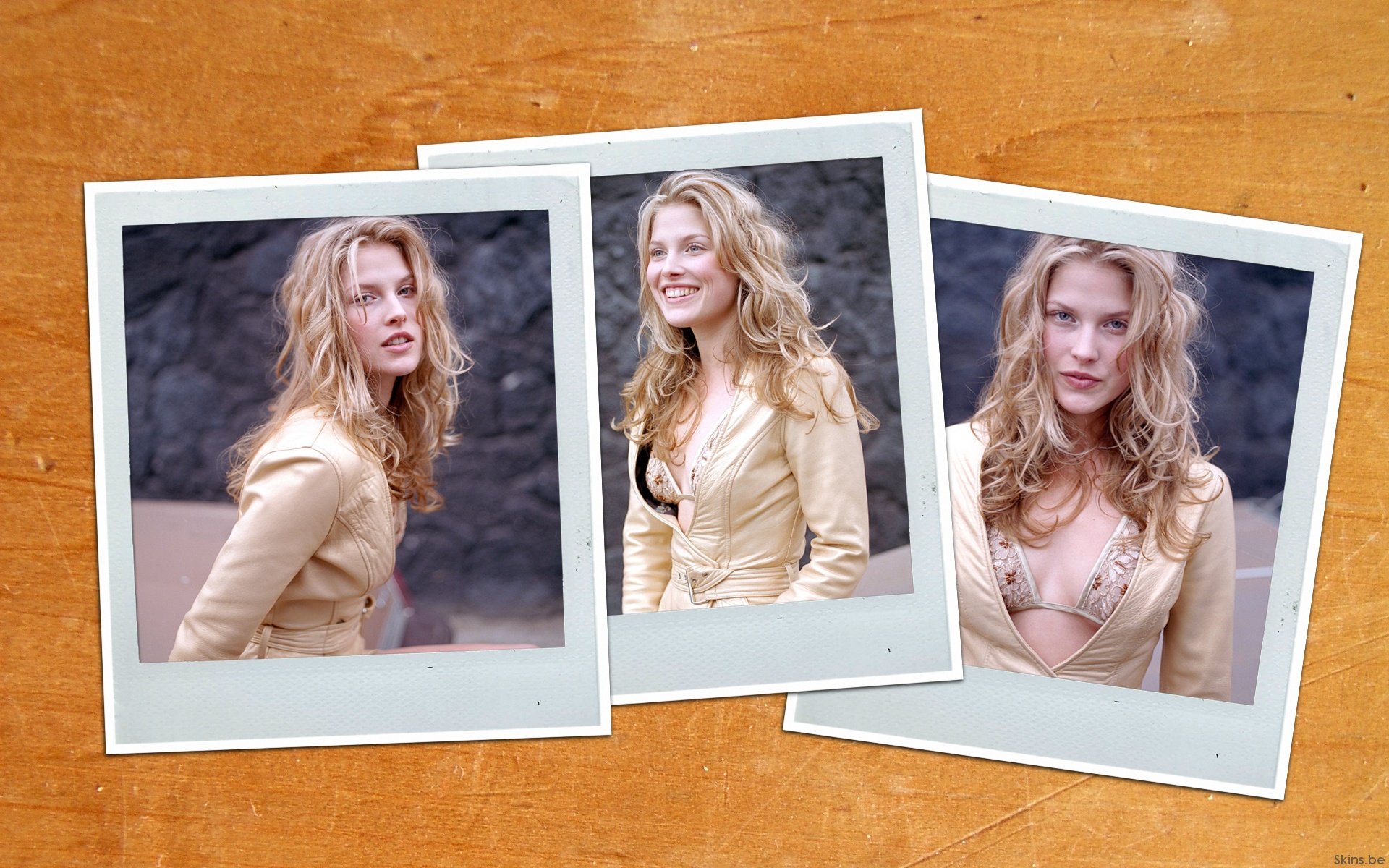 HD PC desktop wallpaper featuring three Polaroid-style photos of celebrity Ali Larter against a wooden background.