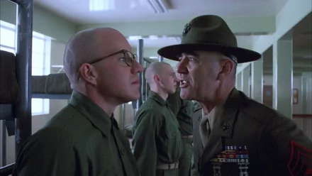 HD PC desktop wallpaper from the movie Full Metal Jacket, featuring an intense confrontation between a drill instructor and a recruit in military barracks.