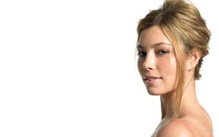 HD PC desktop wallpaper featuring a close-up of celebrity Jessica Biel with a neutral expression and light makeup against a white background.