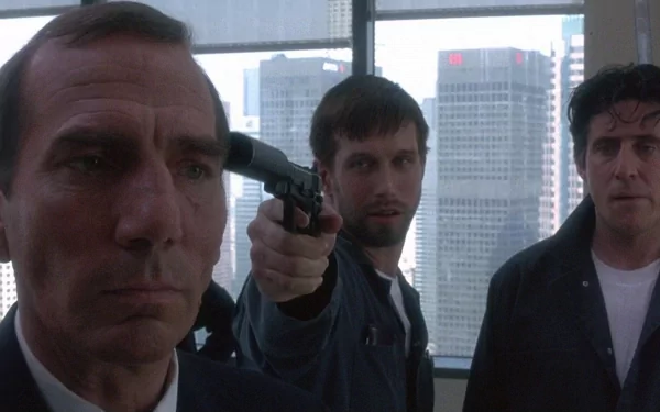 HD desktop wallpaper featuring actors Gabriel Byrne, Stephen Baldwin, and Pete Postlethwaite in a suspenseful scene from The Usual Suspects.