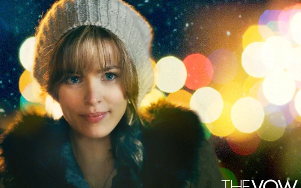 HD PC desktop wallpaper featuring Rachel McAdams from the movie The Vow, with a cozy winter hat and blurred colorful lights in the background.