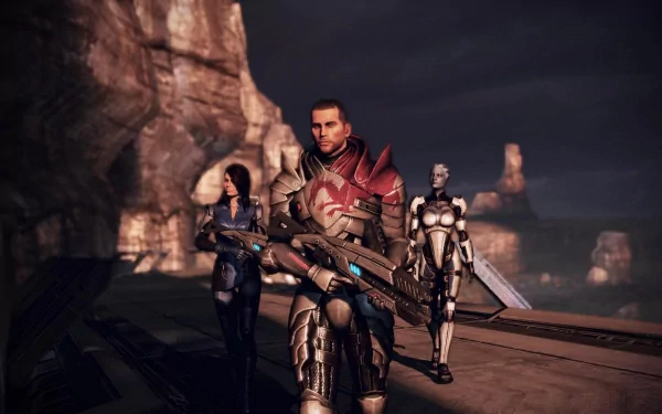 HD Mass Effect 3 desktop wallpaper featuring Commander Shepard, Liara T'Soni, and Ashley Williams standing on a rocky cliff with a dark, moody sky backdrop.