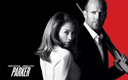 HD PC desktop wallpaper featuring Jason Statham and Jennifer Lopez from the movie Parker, with a bold red and black background.