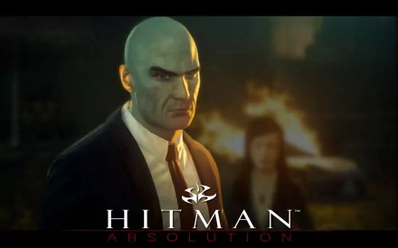HD PC desktop wallpaper for the video game Hitman: Absolution — Agent 47 in a dark suit, bald and stern, stands before a firelit, blurred background with the Hitman logo below.
