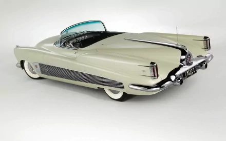 1951 Buick XP-300 Convertible showcased in a high-definition PC desktop wallpaper with sleek, classic design and elegant cream finish.