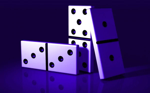HD PC desktop wallpaper featuring a close-up of glossy, man-made dominos arranged against a dark purple background with dramatic lighting.