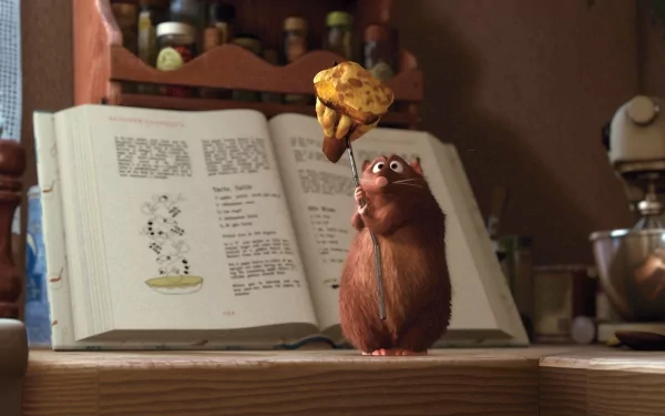 HD wallpaper featuring a scene from the movie Ratatouille, showing a rat holding a piece of food in front of an open cookbook in a cozy kitchen setting.