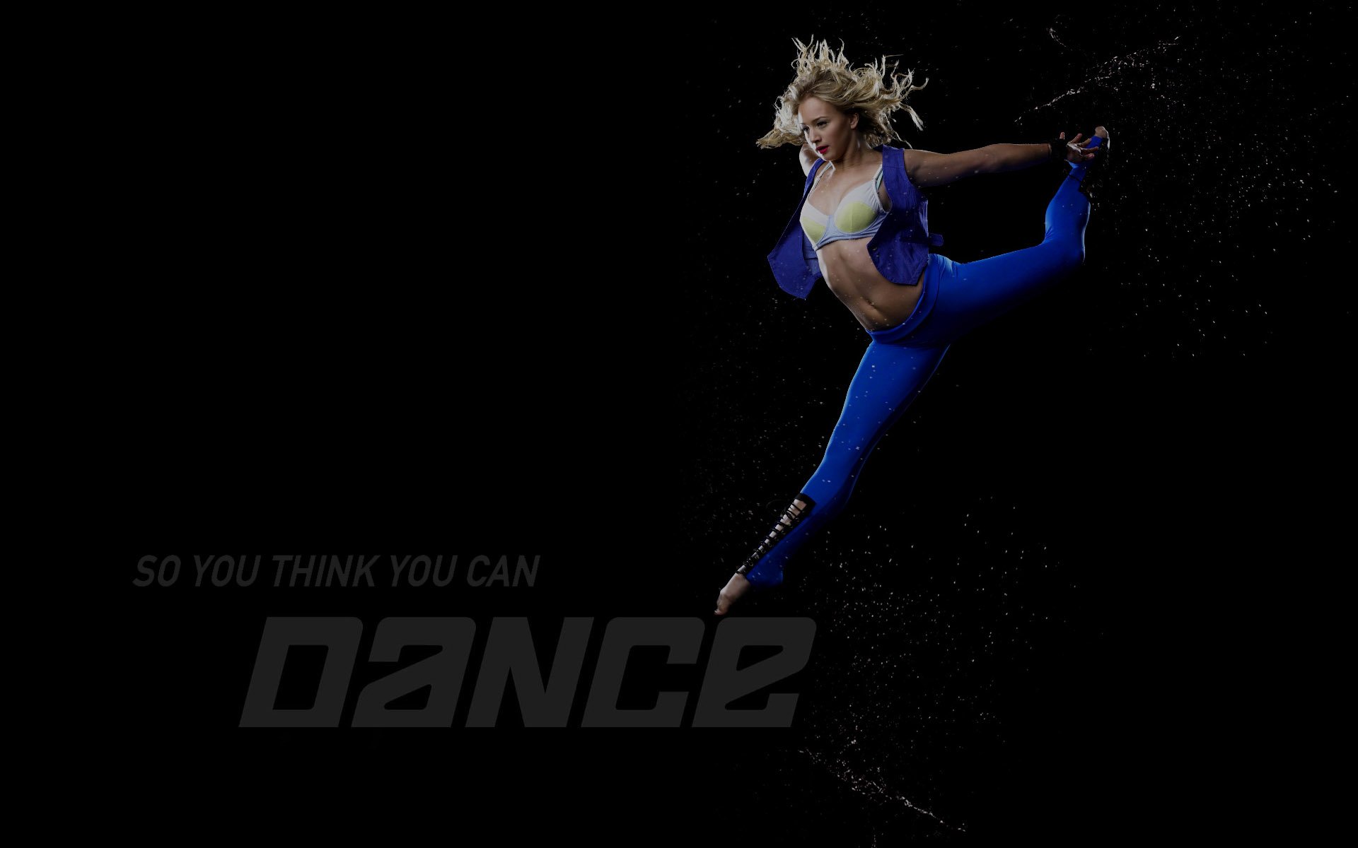 HD PC desktop wallpaper of a dancer mid-air in a blue outfit, performing a leap; So You Think You Can Dance TV show logo on a dark background.