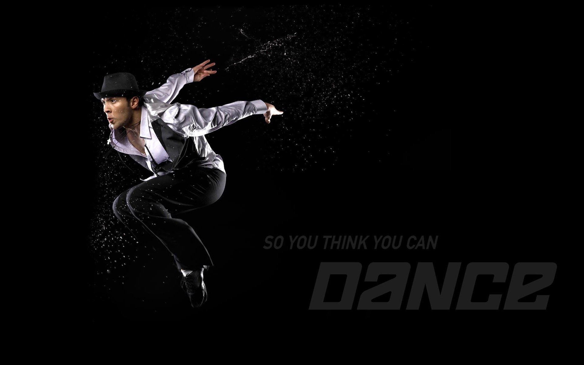 A dancer in mid-air jump wearing a hat and white shirt on a black background, featured as an HD desktop wallpaper for the TV show So You Think You Can Dance.
