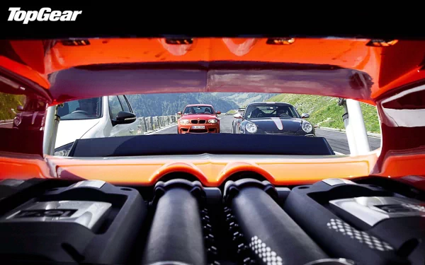 HD desktop wallpaper featuring a view from inside a car's engine bay with the Top Gear logo and two cars in the distance.