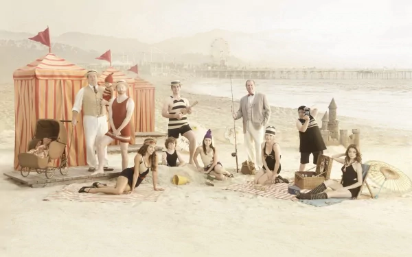 HD desktop wallpaper featuring Modern Family characters in a vintage beach setting.