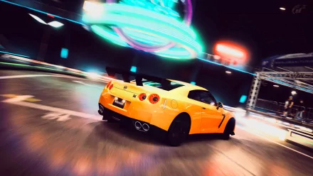 HD wallpaper of a Nissan GT-R in motion at night, with blurred city lights in the background creating a dynamic scene.
