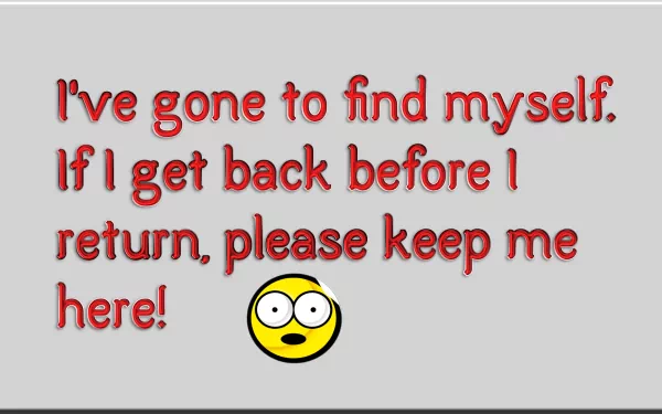 A humorous HD desktop wallpaper featuring a yellow smiley face and a playful quote about self-discovery, adding a fun touch to your screen.