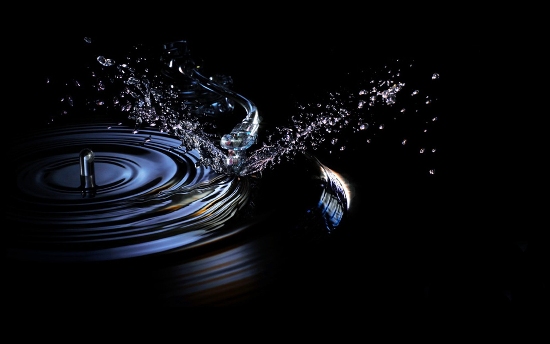 HD PC desktop wallpaper/background: a music-themed vinyl record with water splashing into ripples and droplets against black, forming abstract motion.