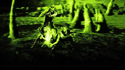 A dramatic HD wallpaper from the movie Pitch Black, featuring four protagonists in a vibrant green setting, showcasing a tense standoff amid an otherworldly landscape.