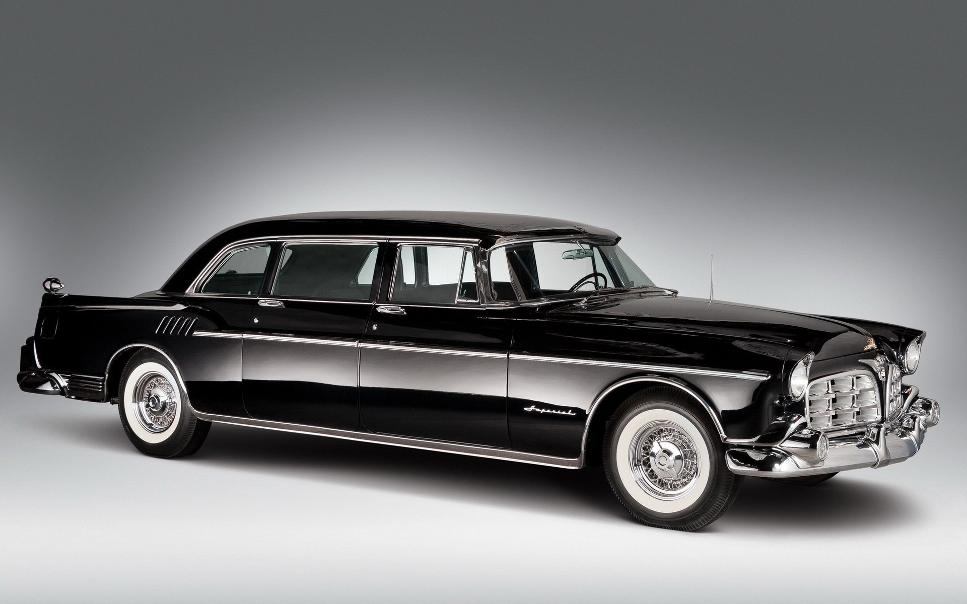 Side view of a sleek black 1956 Chrysler Crown Imperial limousine against a gray background, rendered as an HD PC desktop wallpaper and background.