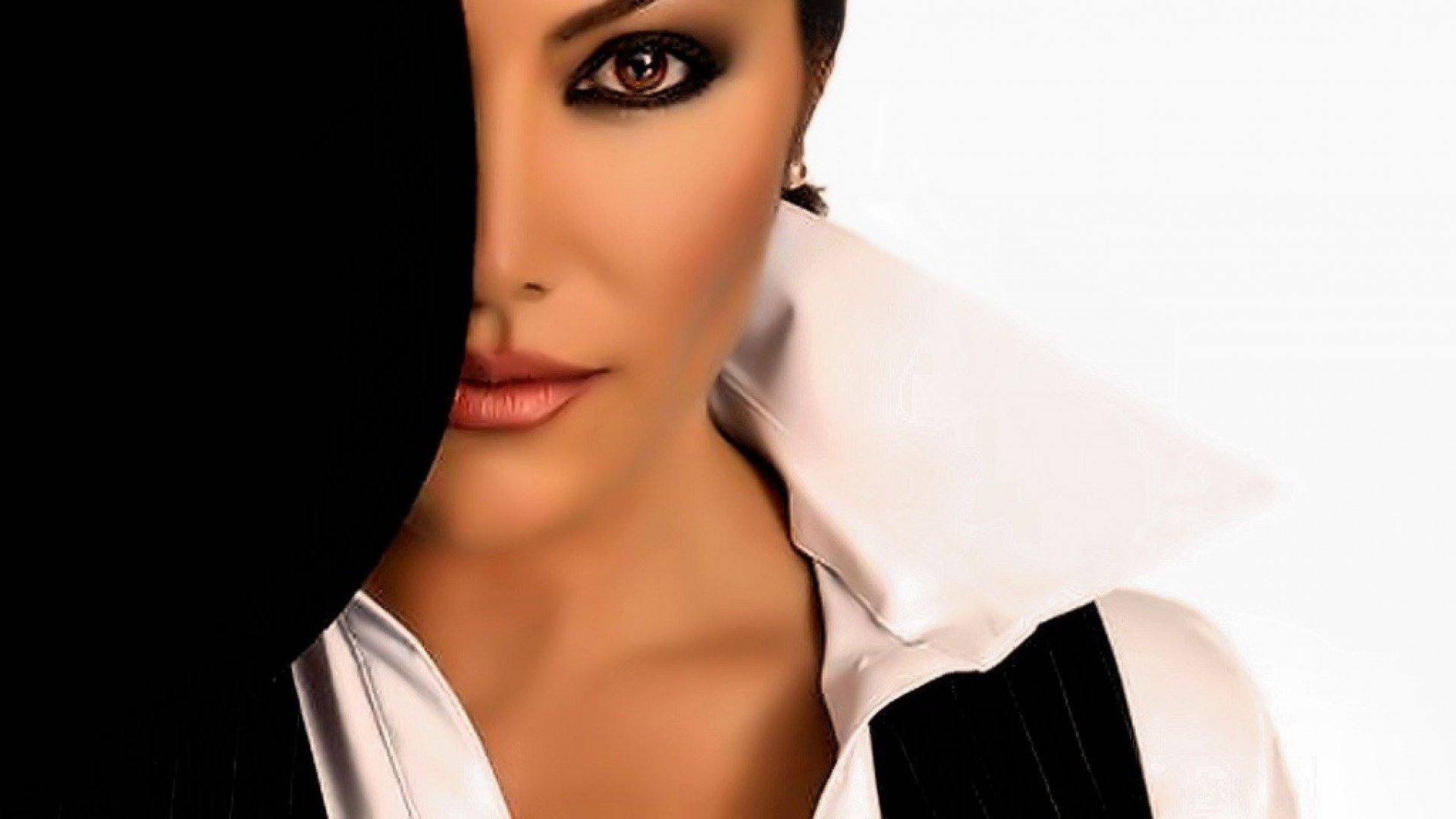 HD PC wallpaper featuring a close-up of a woman’s face with smoky eye makeup, partially covered by dark fabric, against a clean white background.
