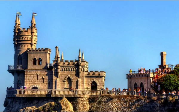 Swallow's Nest, a man-made castle perched on a cliff overlooking the sea in Yalta, Russia, captured in stunning 4K Ultra HD.