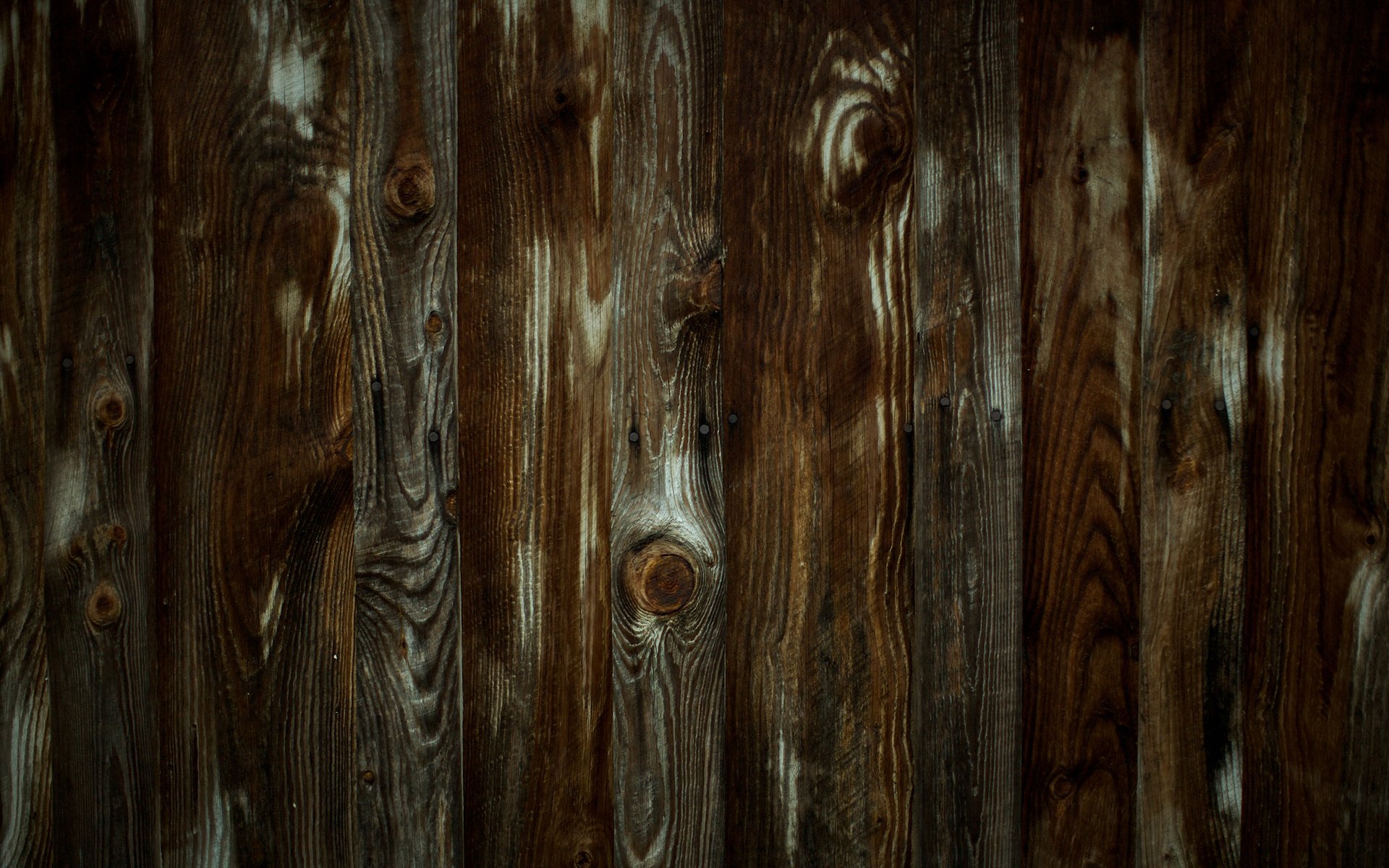 Artistic close-up of dark wooden planks with rich textures, designed as an HD PC desktop wallpaper and background.