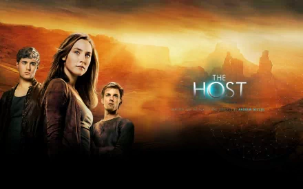 A captivating HD wallpaper featuring Max Irons and Saoirse Ronan in The Host (2013), set against a dramatic landscape with a warm, glowing sky.