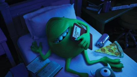 Mike Wazowski relaxes in bed, holding a book titled Scaring 101, surrounded by pizza and books in a cozy, dimly lit scene from *Monsters University*. 4K Ultra HD wallpaper.