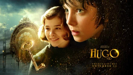 HD desktop wallpaper featuring Asa Butterfield and Chloë Grace Moretz from the movie Hugo, with a vintage clock and key in the background.