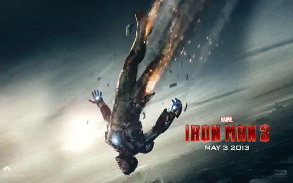 An action-packed HD wallpaper featuring Tony Stark, portrayed by Robert Downey Jr., in a dynamic pose from the movie Iron Man 3, released on May 3, 2013.