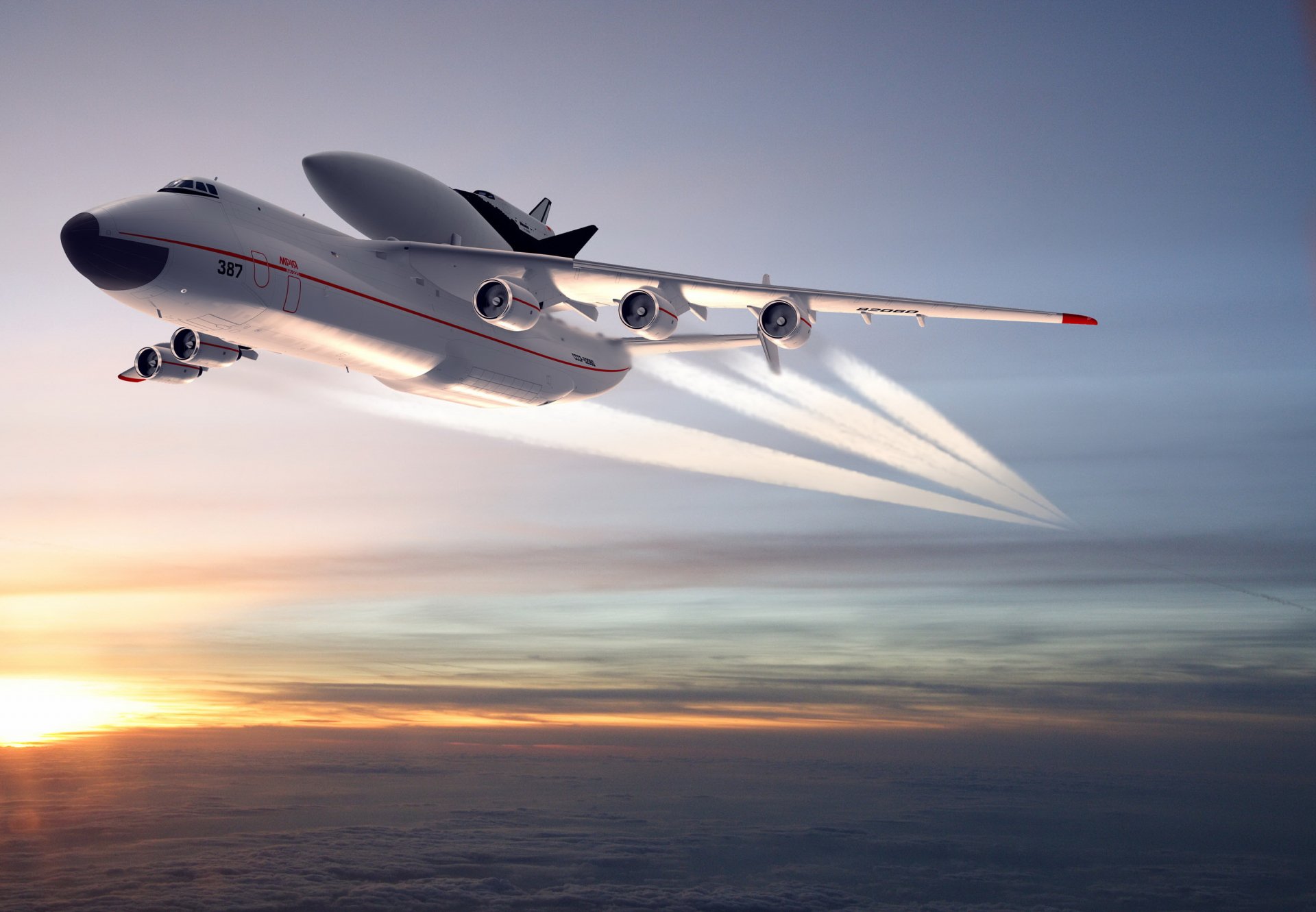 HD desktop wallpaper featuring the Antonov AN-225 Mriya aircraft flying above the clouds during sunset.