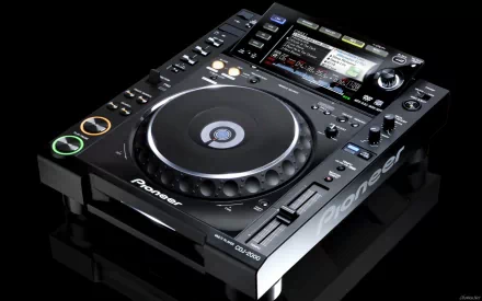Man-made Pioneer DJ HD PC desktop wallpaper showing a Pioneer CDJ media player on a reflective black background with detailed controls and a central jog wheel.