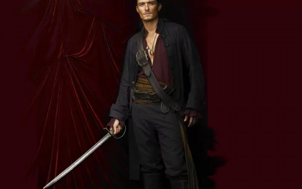 HD desktop wallpaper featuring Orlando Bloom as Will Turner from Pirates of the Caribbean, holding a sword against a dark red background.