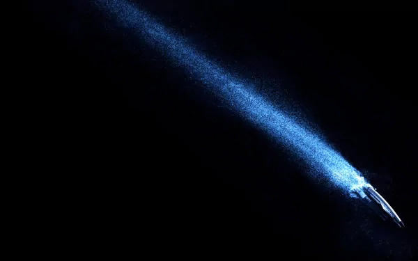 A stunning HD wallpaper of the Normandy SR-1 spaceship from the video game Mass Effect, featuring a striking blue light beam against a dark background.