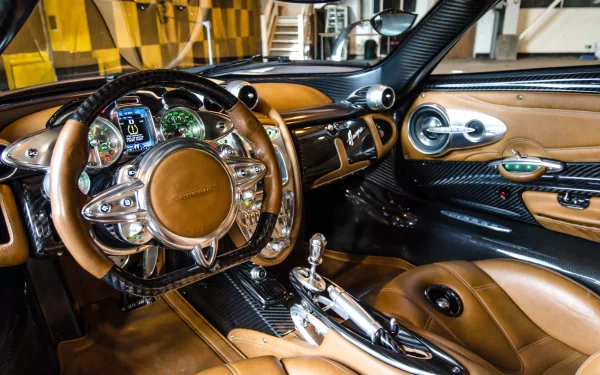 HD PC desktop wallpaper showcasing the luxurious interior and detailed dashboard of a Pagani Huayra vehicle.