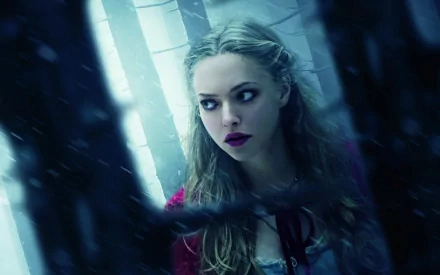 HD desktop wallpaper featuring celebrity Amanda Seyfried with a moody, cinematic blue-toned background.