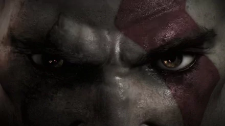 Close-up of Kratos' intense eyes and red war paint from the video game God Of War: Ascension, rendered as an HD PC desktop wallpaper and background.
