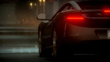 HD PC desktop wallpaper featuring a sleek sports car from the video game Need For Speed: The Run, captured in a moody, rain-soaked urban night scene.