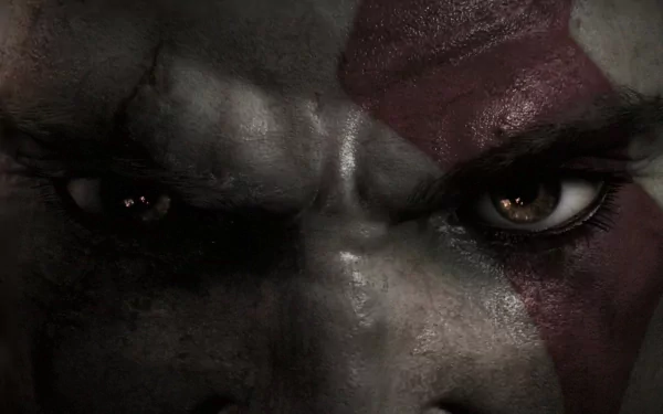 Close-up of Kratos' intense eyes and red war paint from the video game God Of War: Ascension, rendered as an HD PC desktop wallpaper and background.