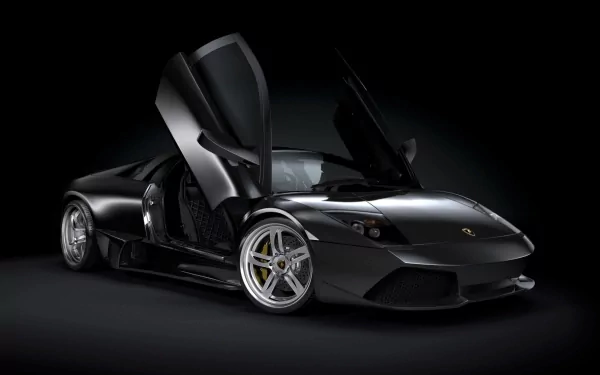 HD desktop wallpaper featuring a sleek black Lamborghini Murcielago with its iconic scissor doors open against a dark background.