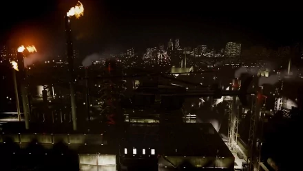 HD desktop wallpaper of Grand Theft Auto IV showing a gritty industrial landscape at night with city lights in the backdrop.