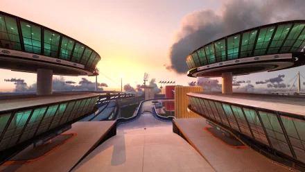HD wallpaper of TrackMania 2 Stadium featuring futuristic race tracks at sunset.