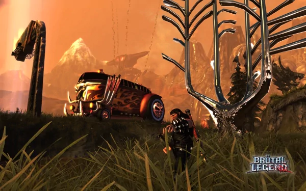 HD desktop wallpaper of Brutal Legend, featuring the game's protagonist beside a flame-decorated car in a fantastical landscape.