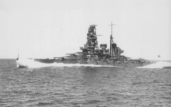 HD black and white image of the Japanese battleship Haruna, a military battlecruiser warship, sailing on the ocean.