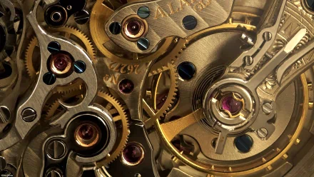 Intricate steampunk watch gears gleam in gold and silver tones, showcasing detailed man-made craftsmanship, making this an eye-catching HD desktop wallpaper.