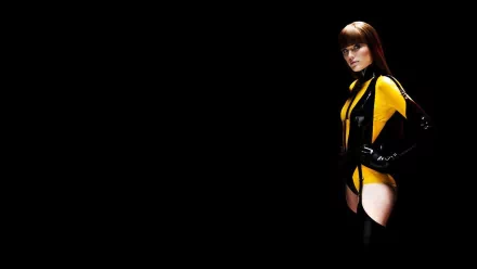 HD PC desktop wallpaper featuring a character from the movie Watchmen in a black and yellow costume against a solid black background.