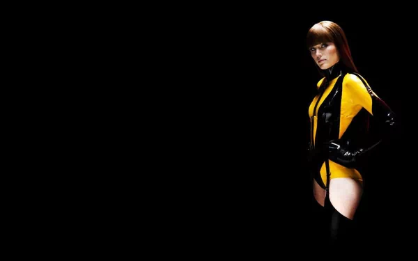 HD PC desktop wallpaper featuring a character from the movie Watchmen in a black and yellow costume against a solid black background.