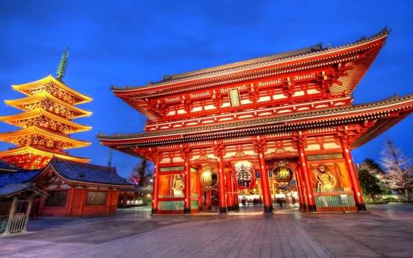 HD desktop wallpaper showcasing the illuminated Asakusa Kannon Temple and its five-story pagoda at twilight, highlighting its vibrant religious architecture.